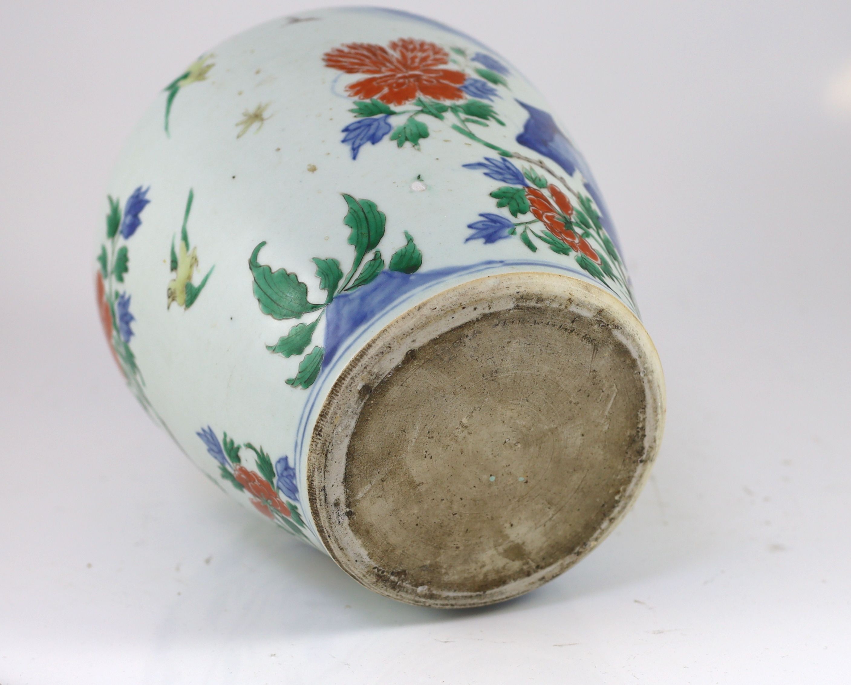 A Chinese transitional wucai jar and cover, c.1650, 36cm high, some damage